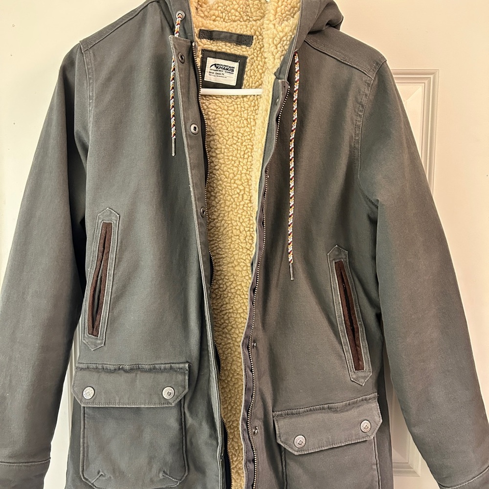 Gray, mountsin khaki, Sherpa lined barn coat.